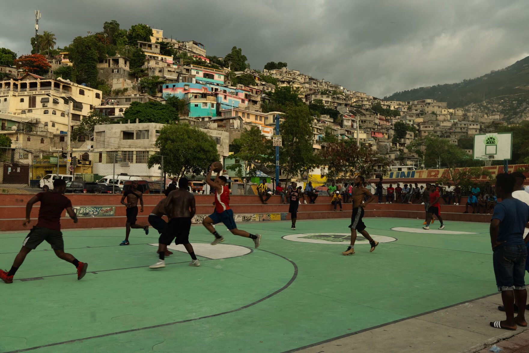 Fear stalks Haitians as their murdered president is buried and gangs terrorize the capital